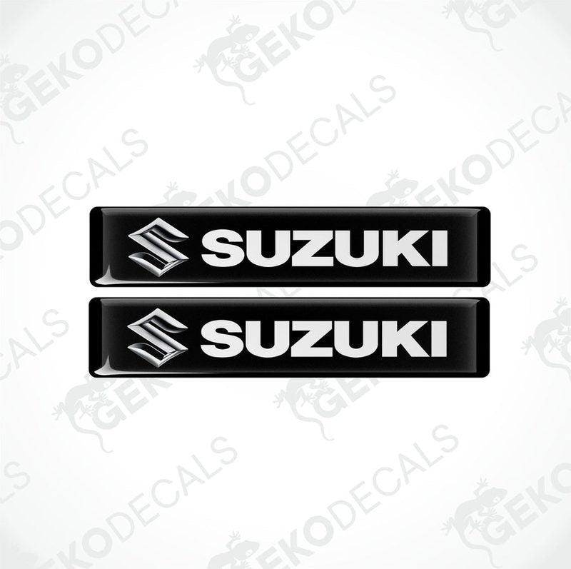 Two black vinyl stickers with the text 'SUZUKI' and the Suzuki logo.