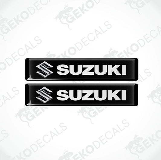Two black vinyl stickers with the text 'SUZUKI' and the Suzuki logo.