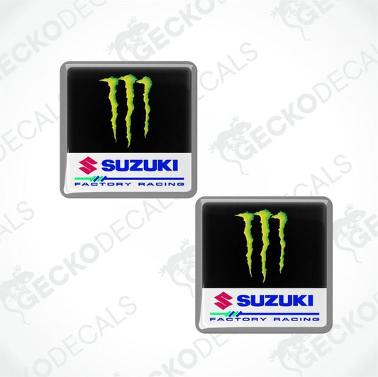 Two Suzuki Factory Racing decals with Monster Energy logo on a white background.