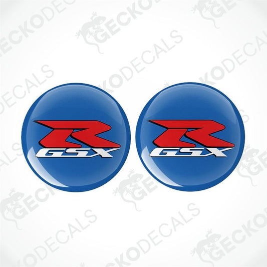 Two round blue decals with red and white 'GSX' logo on a white background.