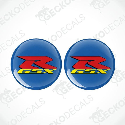 Two round blue decals with a red and yellow 'GSX' logo on a white background.