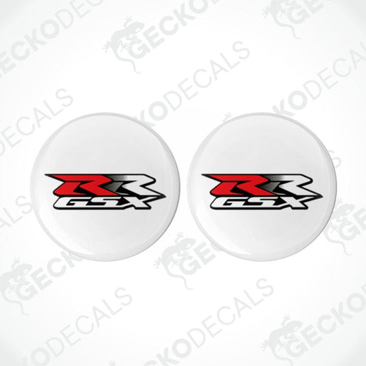 Two white circular stickers with a red and black logo on a white background.
