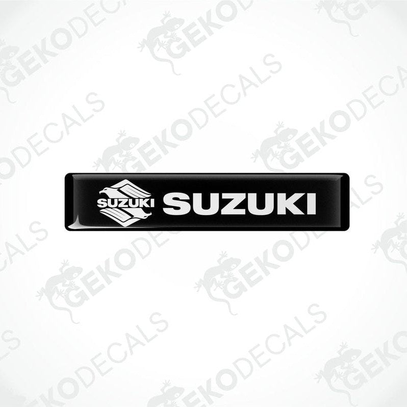Black vinyl stickers with the word 'SUZUKI' printed on them.