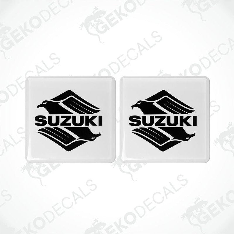 Two withe and black vinyl decals with the SUZUKI INTRUDER logo
