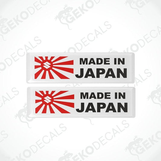 Two rectangular vinyl decals with a polyurethane coating featuring the text 'MADE IN JAPAN' and a red sun emblem.