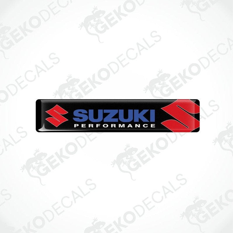 Rectangular black vinyl decals with the 'Suzuki Performance' logo in red and white.