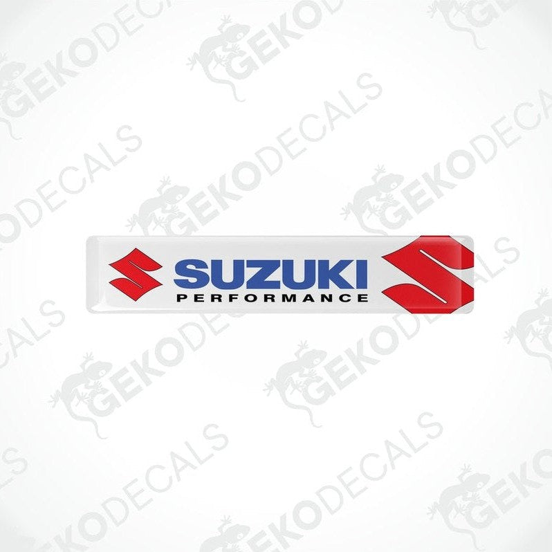  Rectangular withe vinyl decals with the 'Suzuki Performance' logo in red and black.