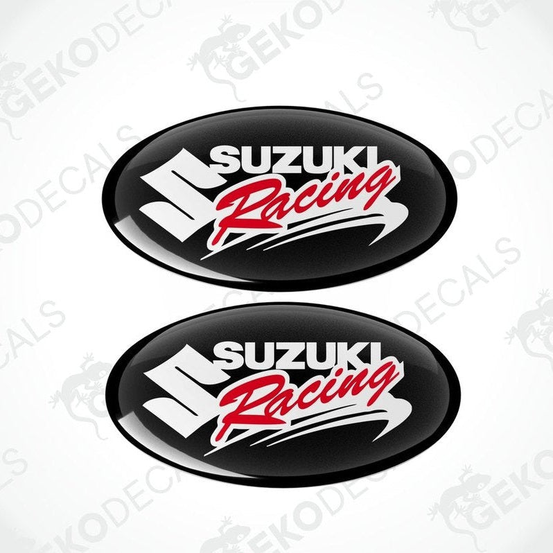 Two black vinyl stickers with the text 'SUZUKI RACING' in red and white.