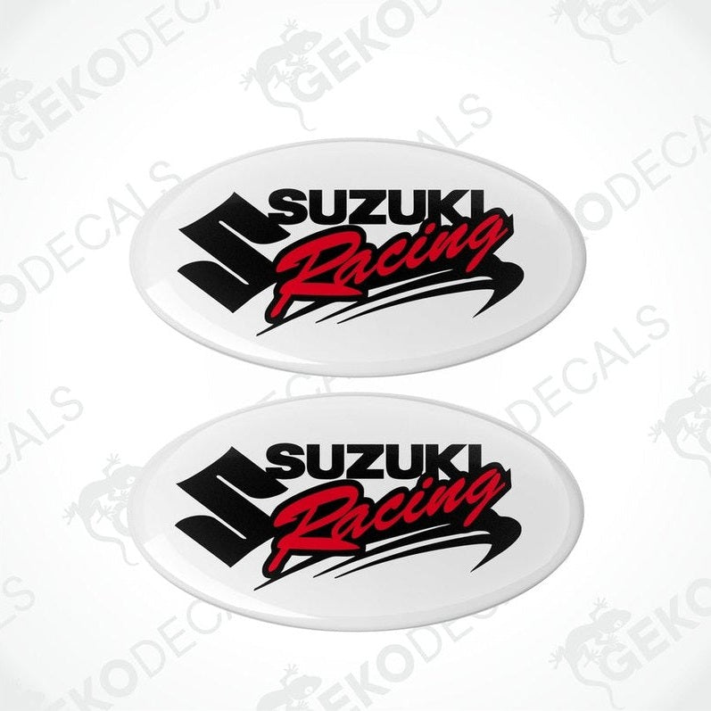 Two withe vinyl stickers with the text 'SUZUKI RACING' in red and black.