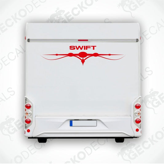 A white caravan with a red and black 'SWIFT' decal on the rear side.