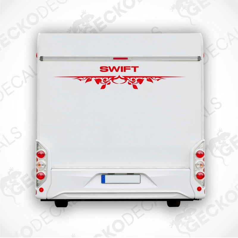 A white caravan with a red and black 'SWIFT' decal on the rear side.