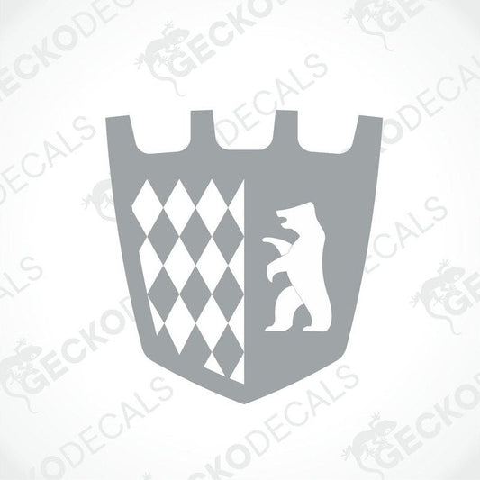 A gray die cut sticker with a shield design, featuring a bear and a checkered pattern, delivered on transfer paper.