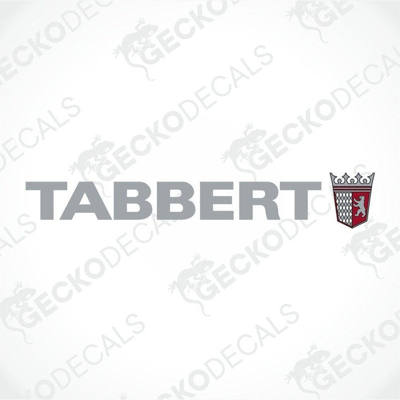 A die cut sticker with the brand name 'TABBERT' printed in a bold, clear font, accompanied by a graphic of a shield with a crest.