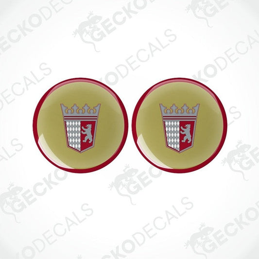 Two round vinyl stickers with a geometric pattern, consisting of a red and white emblem on a beige background, surrounded by a red border.
