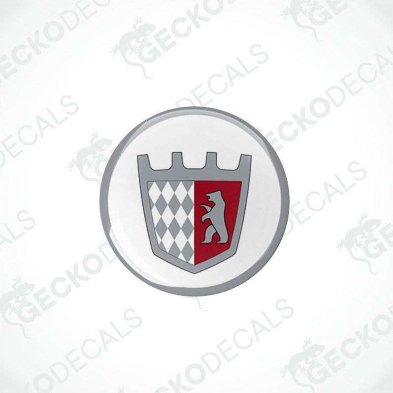 Two round vinyl stickers with a geometric pattern and a castle motif in red, white, and black colors on a transparent background.
