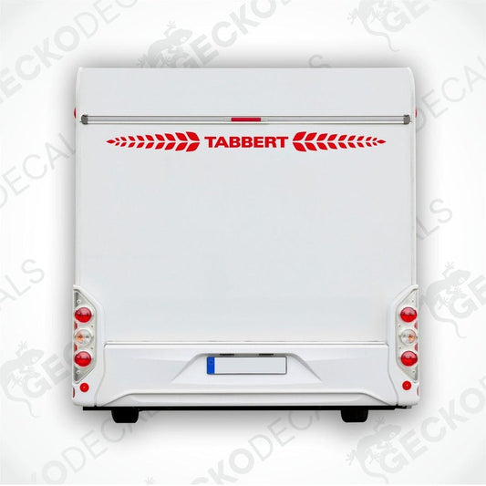 A white Tabbert sticker on the back of a car decal, depicting the brand's logo with red and grey accents.