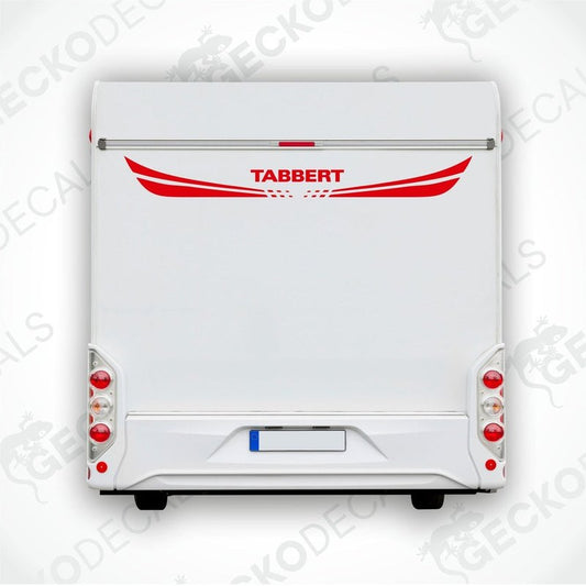 A white caravan with a red and white 'Tabbert' sticker on the back door.