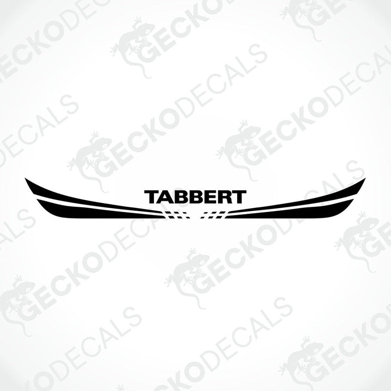 A white caravan with a red and white 'Tabbert' sticker on the back door.