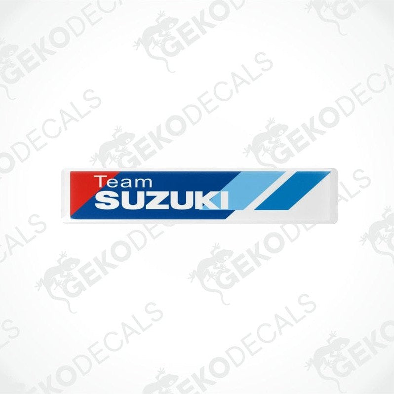 Blue, white, and red vinyl stickers with 'TEAM SUZUKI' text and Suzuki logo.