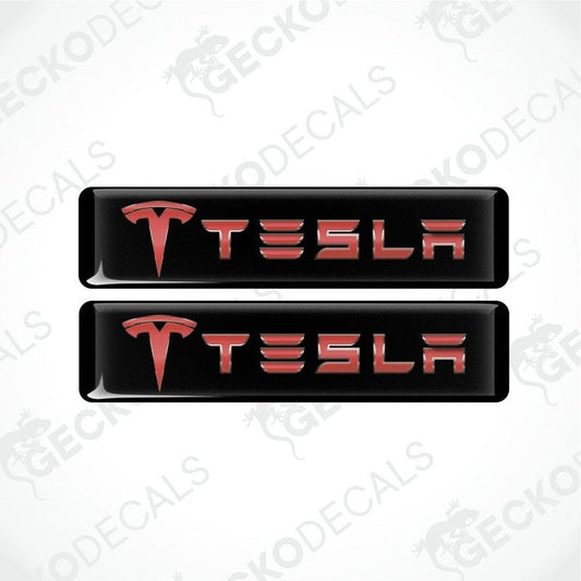 Two Tesla logo decal stickers on a white background with 'Gecko Decals' branding.