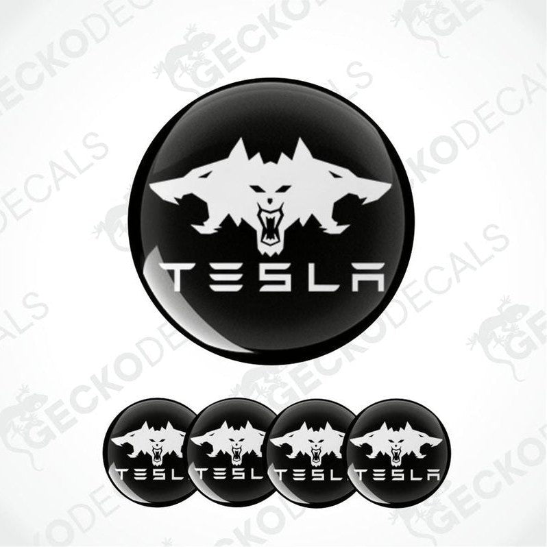 Tesla logo with wolf design on a black background, surrounded by five smaller versions of the same design.