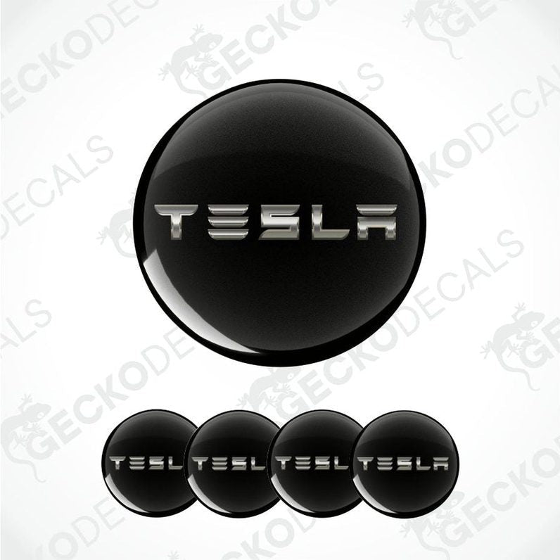 Black Tesla logo decal on a white background