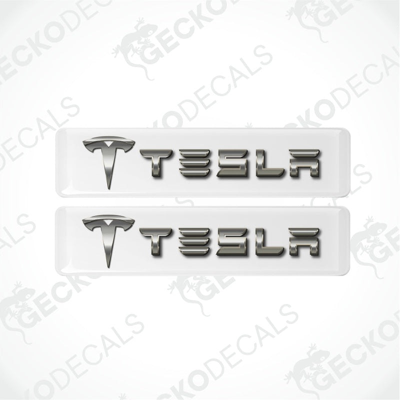 Two Tesla logo decals on a white background with 'Gecko Decals' branding.
