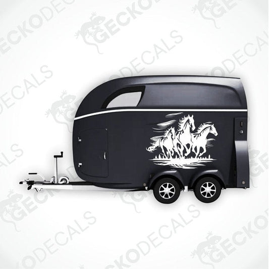 A black trailer with a die cut decal featuring three running horses on the side.