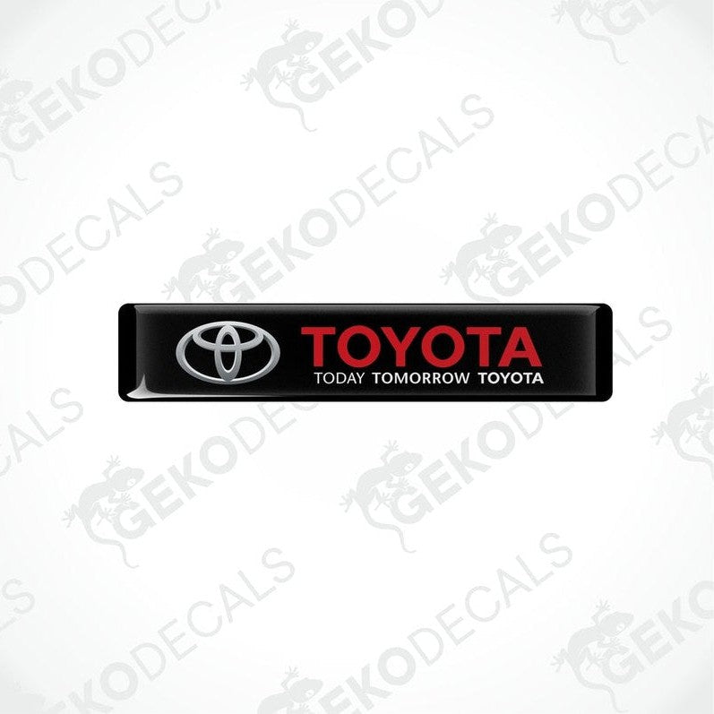  Black vinyl stickers with the Toyota logo and the text 'TODAY TOMORROW TOYOTA' printed on them.