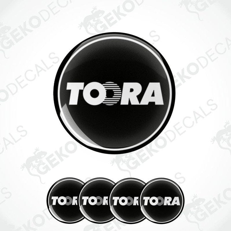A set of four black vinyl decals with the brand name 'TOORA' in white letters.