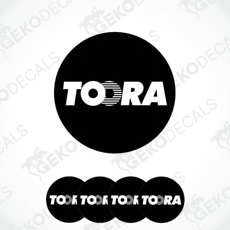 A set of black vinyl decals with the brand name TOORA, displayed in a circular arrangement with one large decal and four smaller ones.