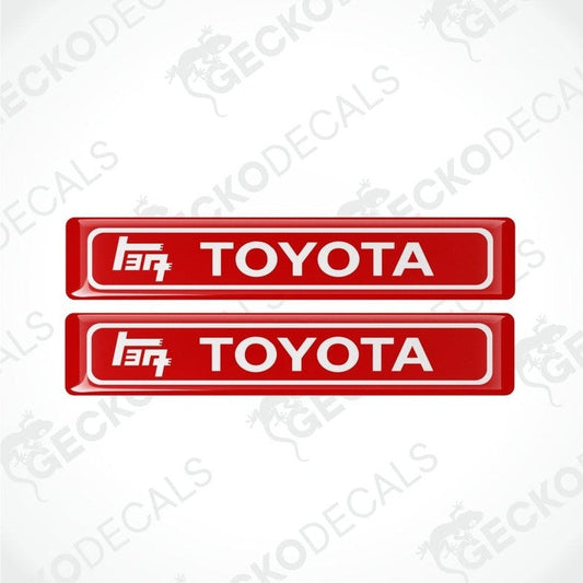 two red rectangles with a white frame, inside which is the Toyota TEQ logo