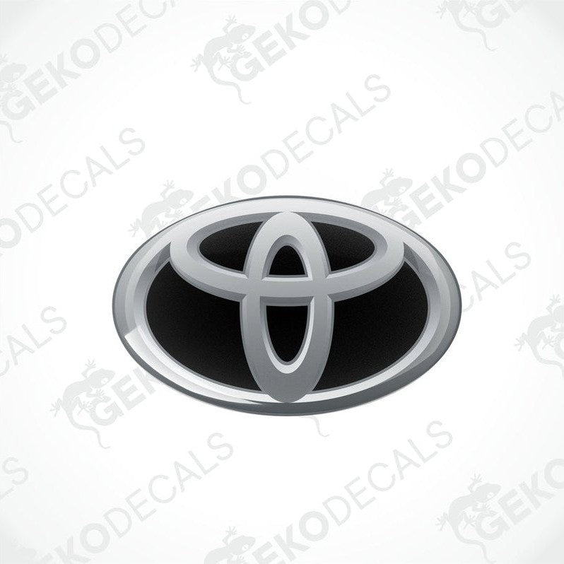 Toyota branded vinyl stickers with a dome shape and a silver and black color scheme.