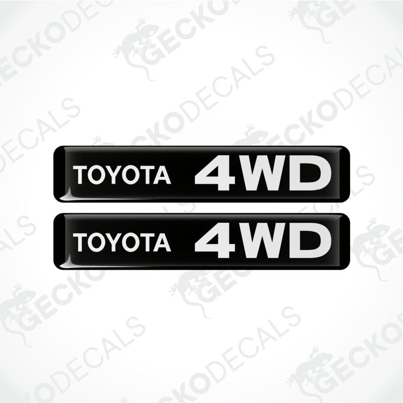 two rectangles with a black background and the words Toyota 4WD in white in the middle