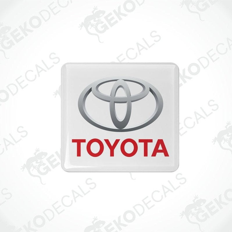 Withe vinyl stickers with the Toyota logo in red and white.