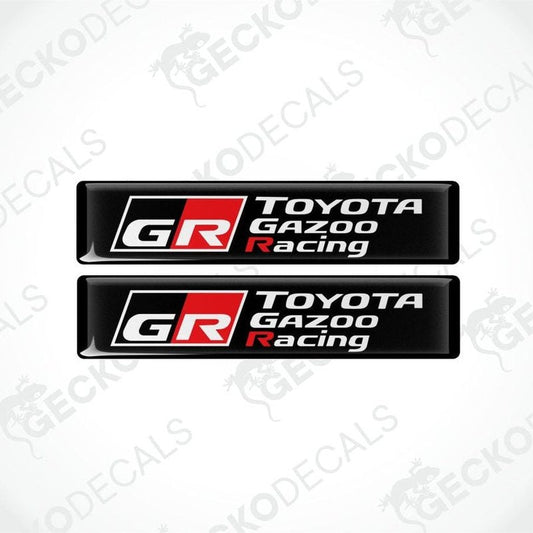 Two Toyota Gazoo Racing logo on black background epoxy decals on a white background with 'Gecko Decals' branding.