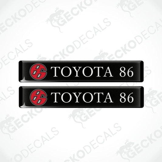 two rectangles with a black background and  in the middle the words Toyota 86 with red 86 logo in front