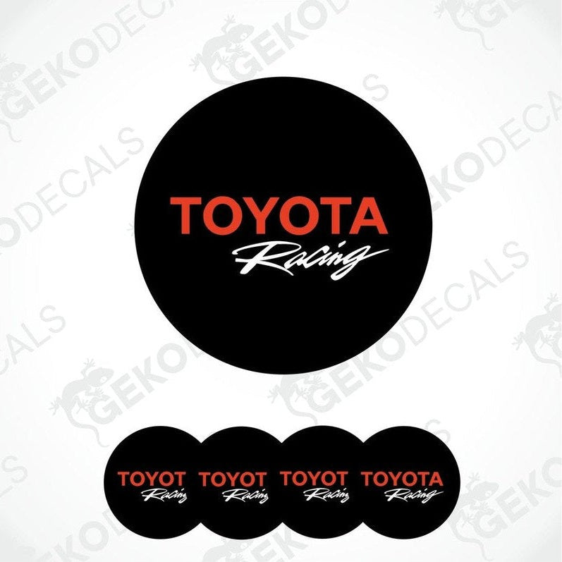 A set of four black vinyl decals with the red text 'TOYOTA Racing' on them, displayed against a white background.