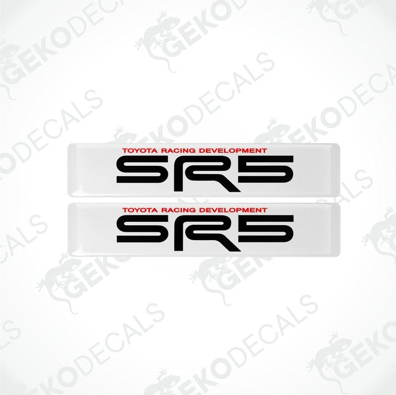 Two withe, red, and black vinyl decals with the text 'SR5 TOYOTA RACING DEVELOPMENT' on them.