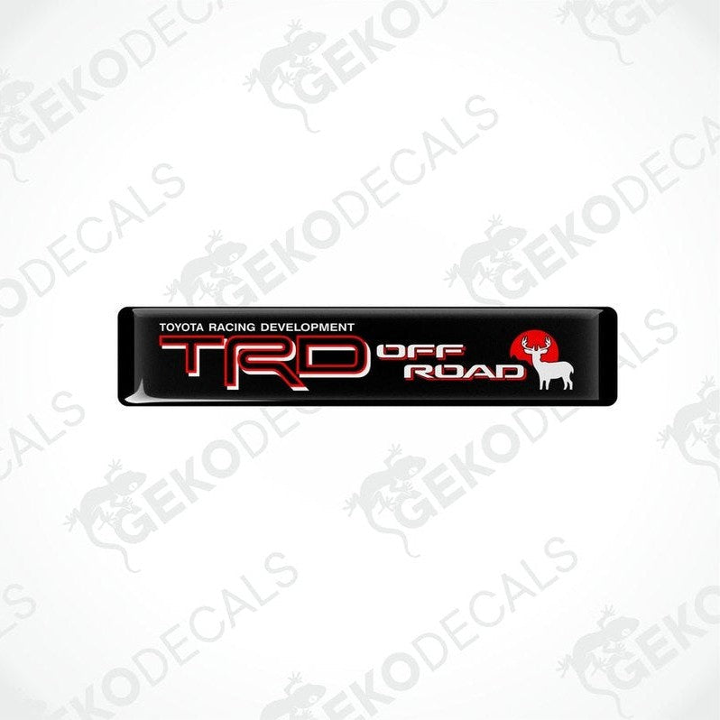 Black vinyl decals with red and white text that read 'TOYOTA RACING DEVELOPMENT TRD OFF ROAD'.