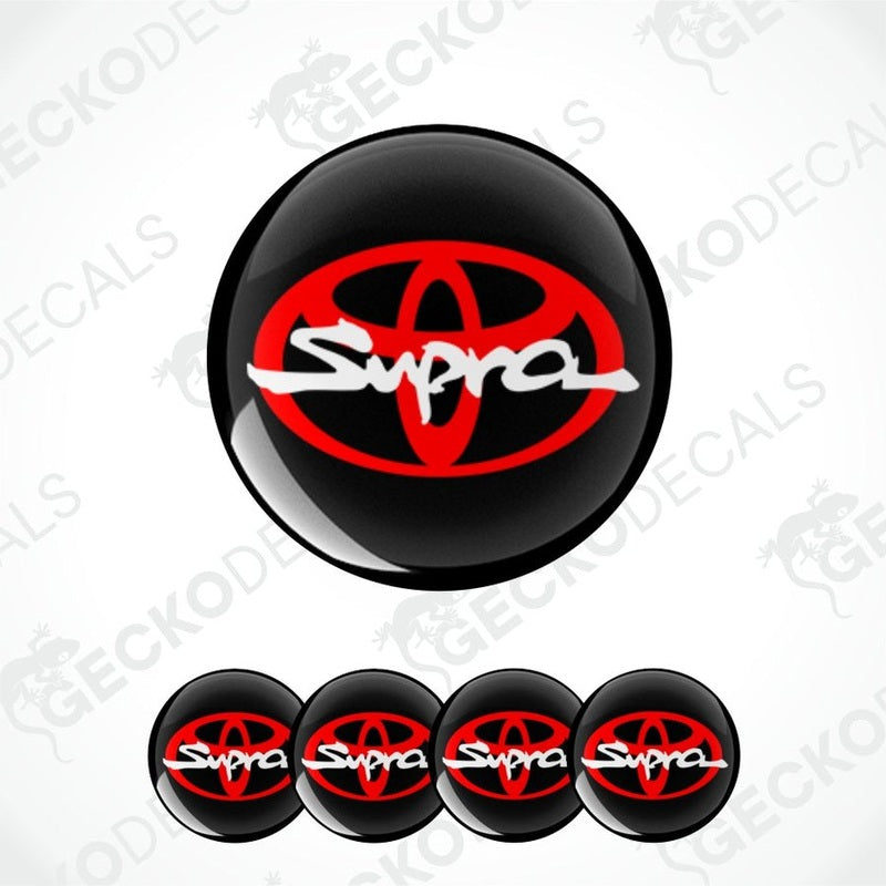 Red Toyota logo with white Supra logo in center on black background epoxy decal, multiple variants on a white background.