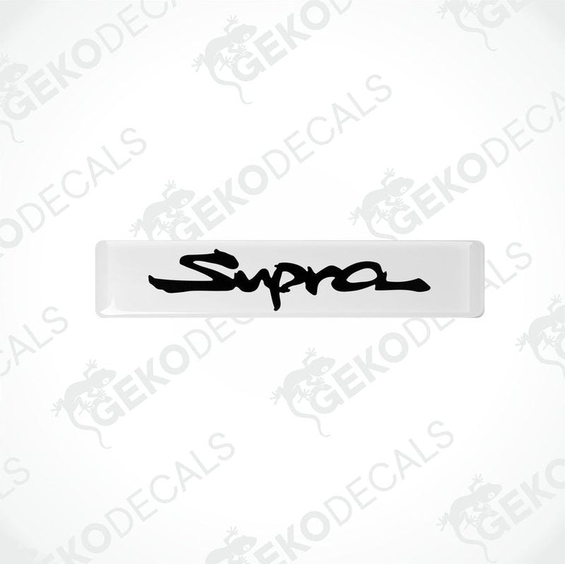 Withe vinyl stickers with the word 'SUPRA' written in black.