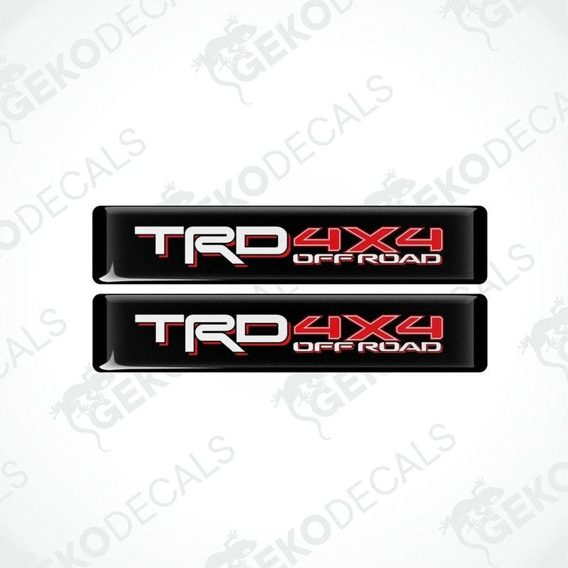 Two black decals with red and white text that reads 'TRD 4X4 OFF ROAD'.