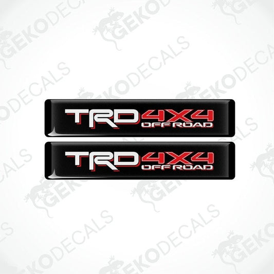 Two black decals with red and white text that reads 'TRD 4X4 OFF ROAD'.