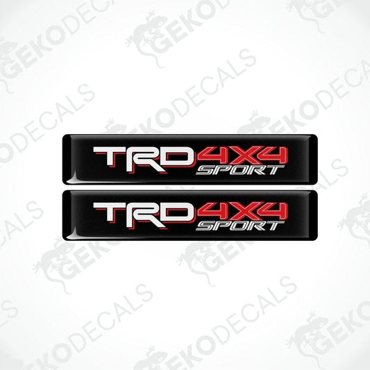 Two black, red, and white car decals with 'TRD 4X4 SPORT' text