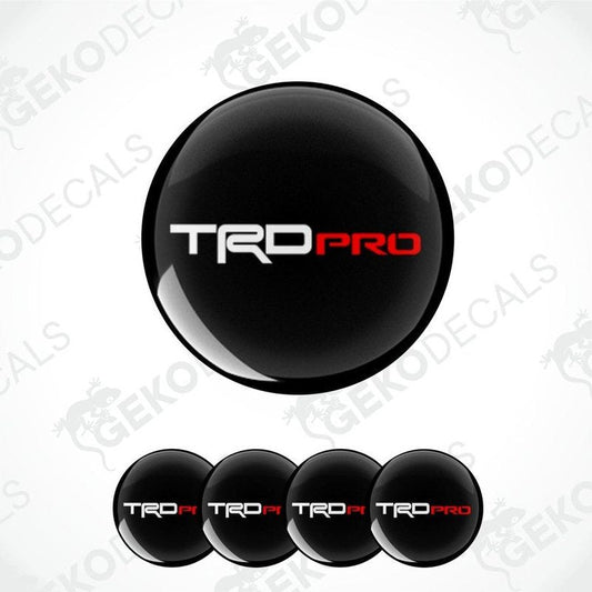 A set of black vinyl decals with the TRD PRO logo on them, displayed on a white background.