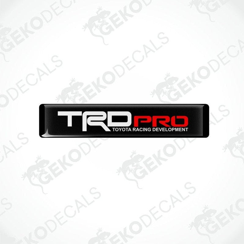  Black vinyl stickers with red and white text 'TRD PRO' and 'TOYOTA RACING DEVELOPMENT', placed on a white background.