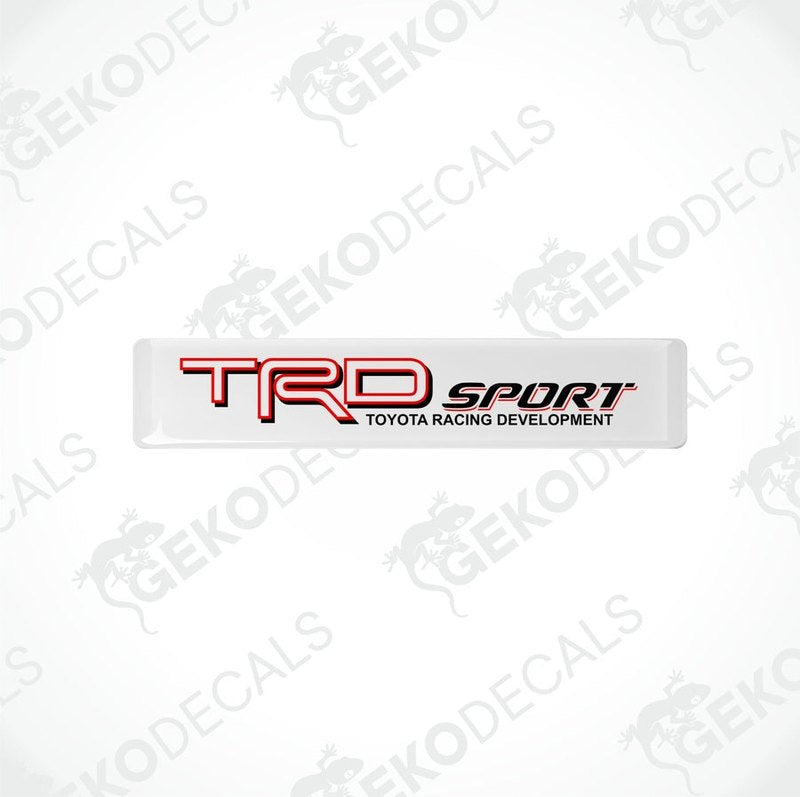 Withe vinyl stickers with red and black text, including the Toyota Racing Development logo.