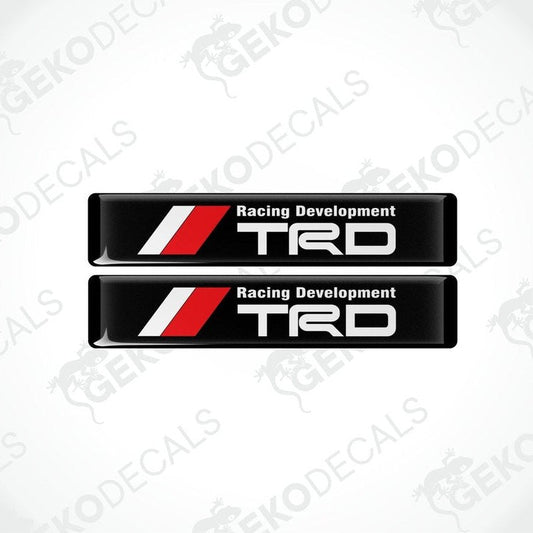Two black, red, and white vinyl decals with the text 'Racing Development TRD' on them.