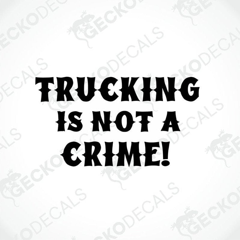 A black die cut decal with the text 'TRUCKING IS NOT A CRIME!' on a white background.